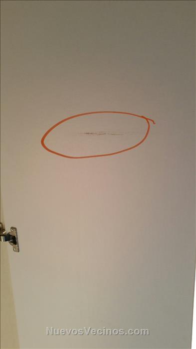 Puerta de armario rozada